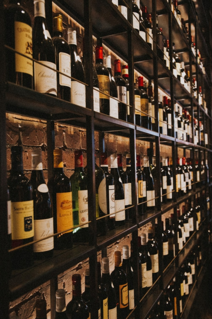 a cabinet holding wine bottles