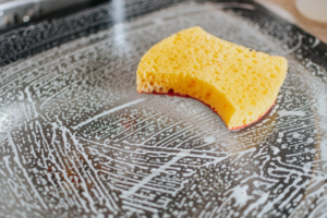 a sponge with soapy water  
