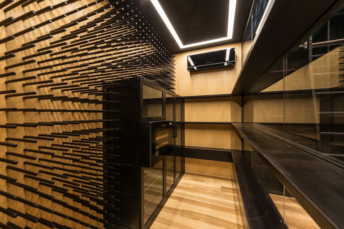 a wine cellar with shelves and racks